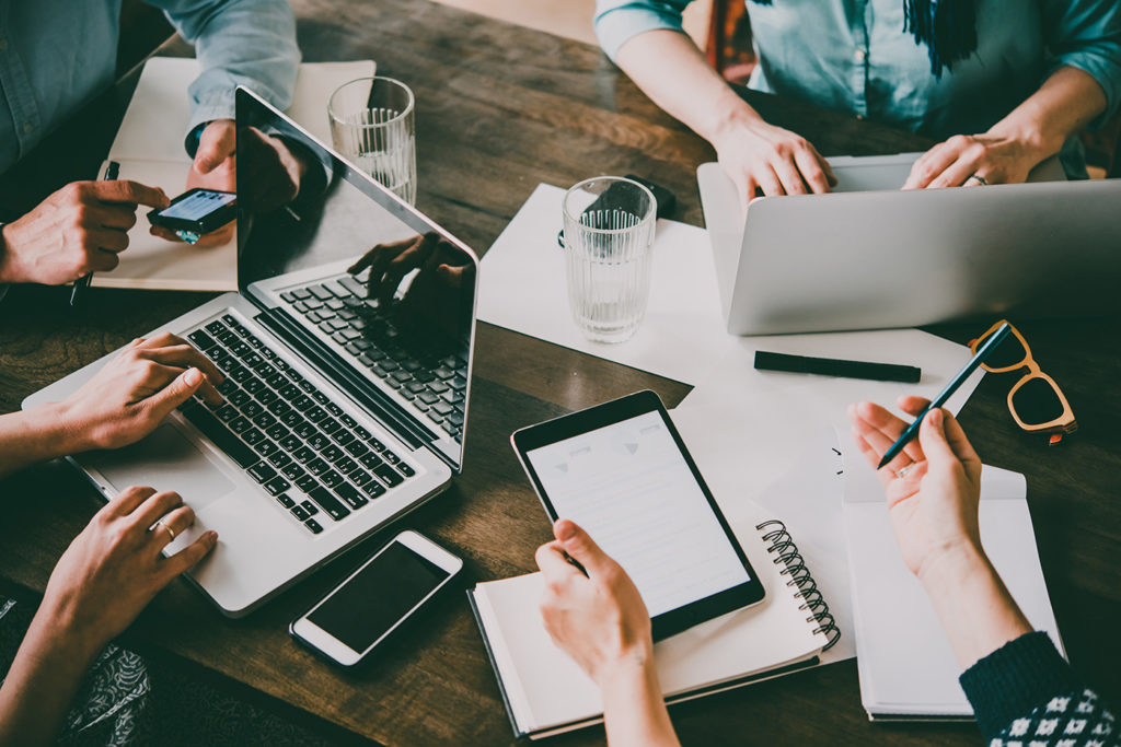 people sitting together working